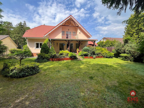 Dom z ogrodem Porosły