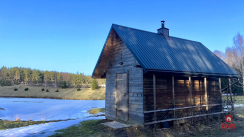 Drewniany dom z działką, sauną i garażem