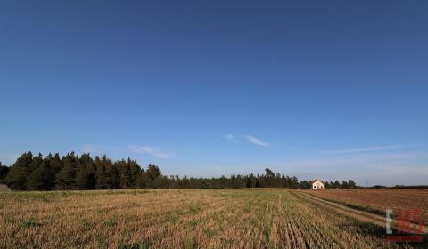 Działka budowlana nad jeziorem z udziałem w plaży